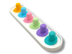 Pastel blue Oral-B iO toothbrush head holder with two heads