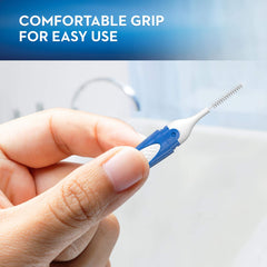 Interdental brush cleaning between teeth
