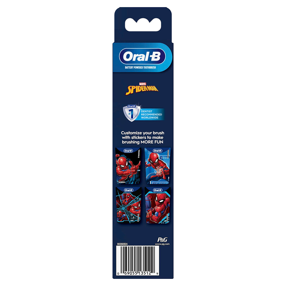 Child brushing with Oral-B Spider-Man toothbrush beside a smartphone displaying the Disney MagicTimer app