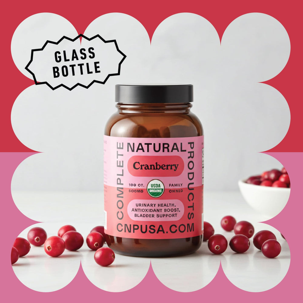 Cranberry capsules with natural ingredients on a white surface