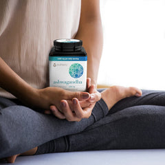 Close-up of Ashwagandha capsules showing 1000mg per day serving