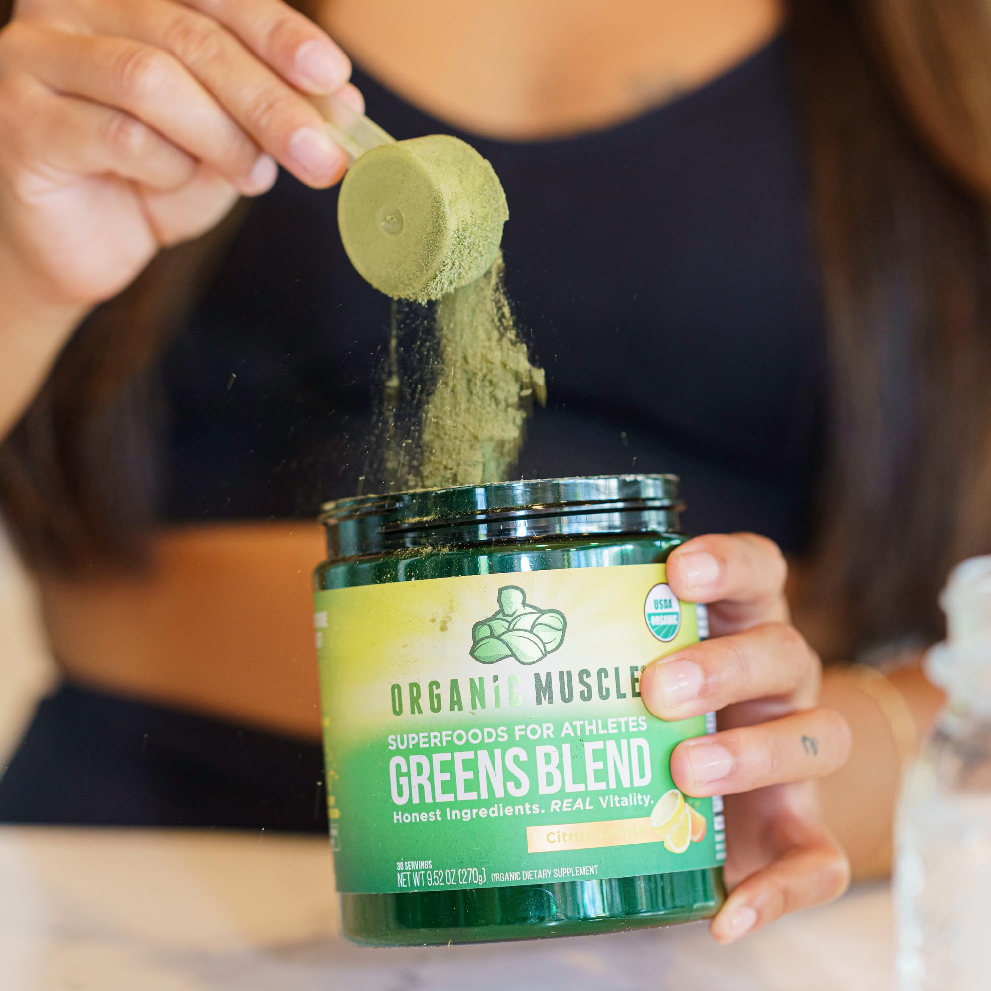 Organic Muscle Super Greens Powder probiotics label underscores gut-friendly nutrition.
