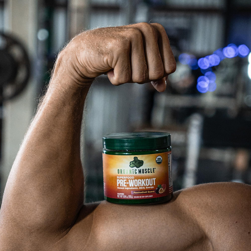 Organic Muscle vegan, non-GMO, gluten-free symbol on packaging.