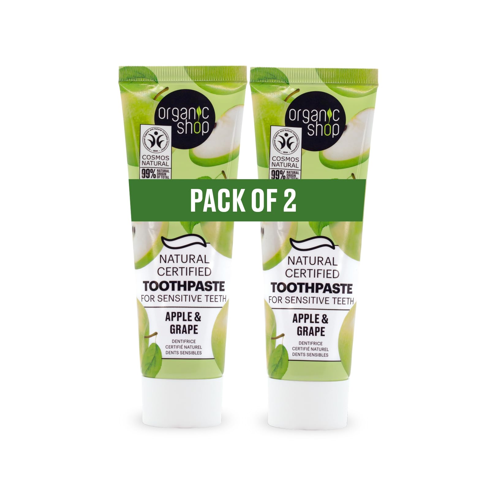 Organic Shop front packaging showing two toothpaste tubes and fresh apples