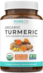 Bottle of Organic Turmeric Ginger Black Pepper supplement showing label
