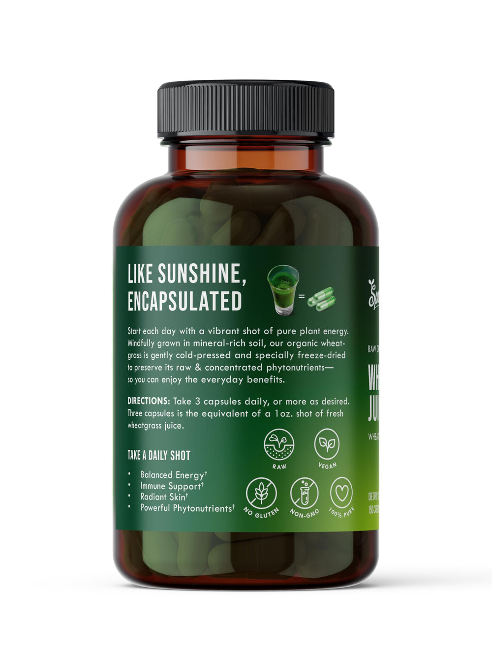 Close-up of organic wheatgrass juice powder capsules