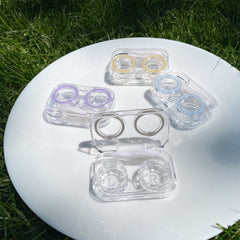Transparent lid showing colored contact lenses without opening