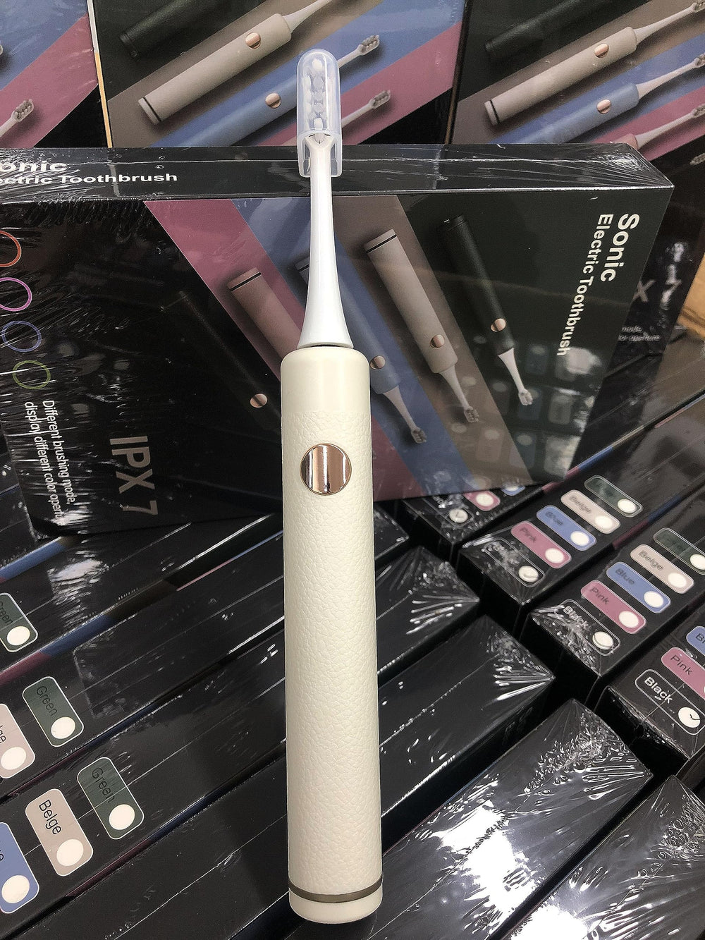 White OUGEER toothbrush with timer and accessories