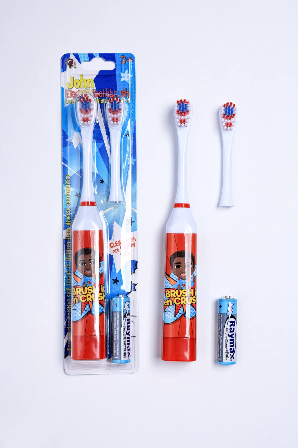 Close-up of soft bristles on OUR REFLECTIONS children's toothbrush in red