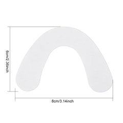 Denture adhesive cushion adhered to a lower denture