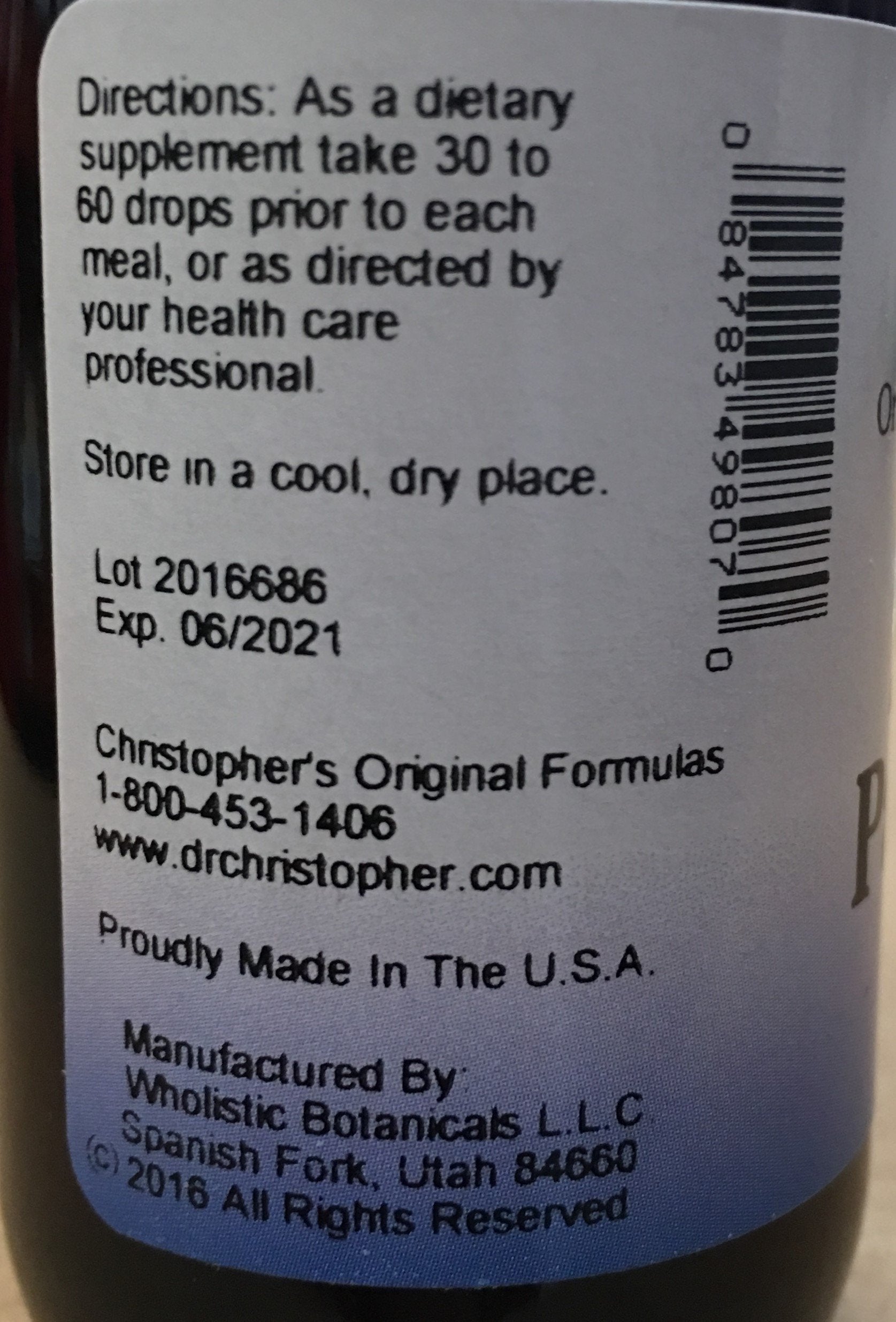 Dropper dispensing formula into a glass