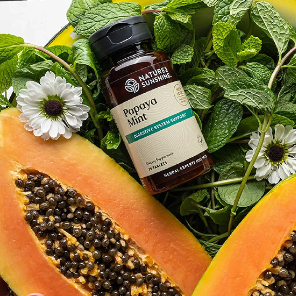 Close-up image of papaya mint chewable tablets for digestion support