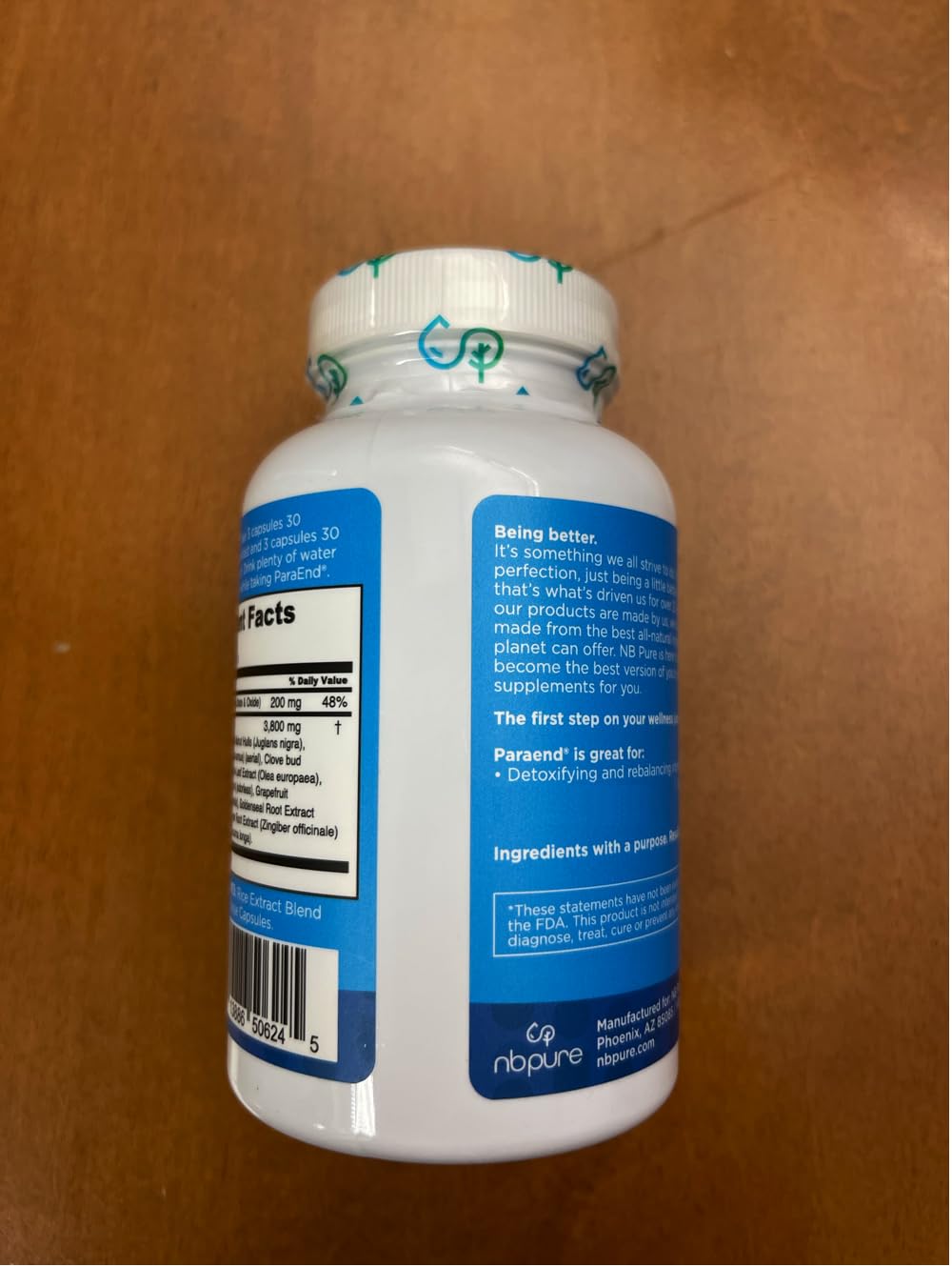 Lifestyle scene with ParaEnd bottle and herbs for wellness