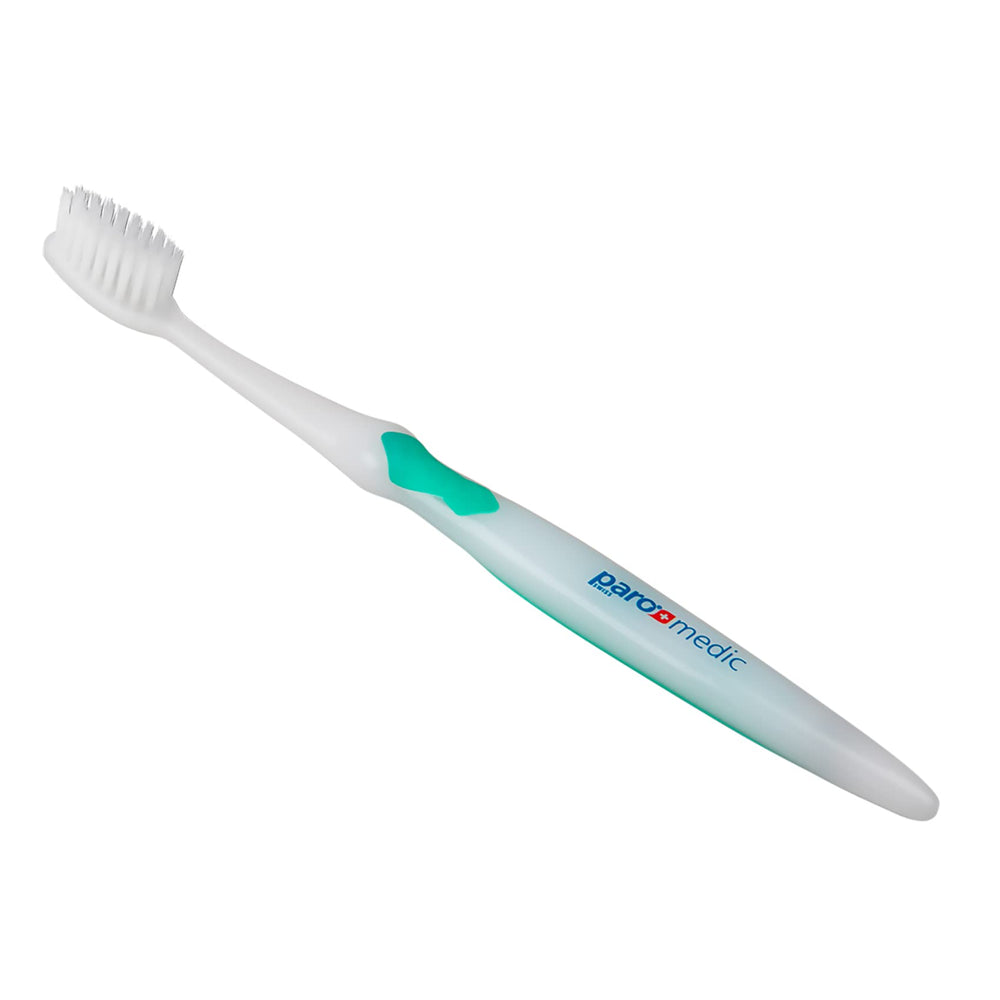 Bristles of Paro Medic toothbrush gently cleaning the gum line
