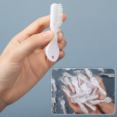 Close-up of short thumbprint handle and soft bristles