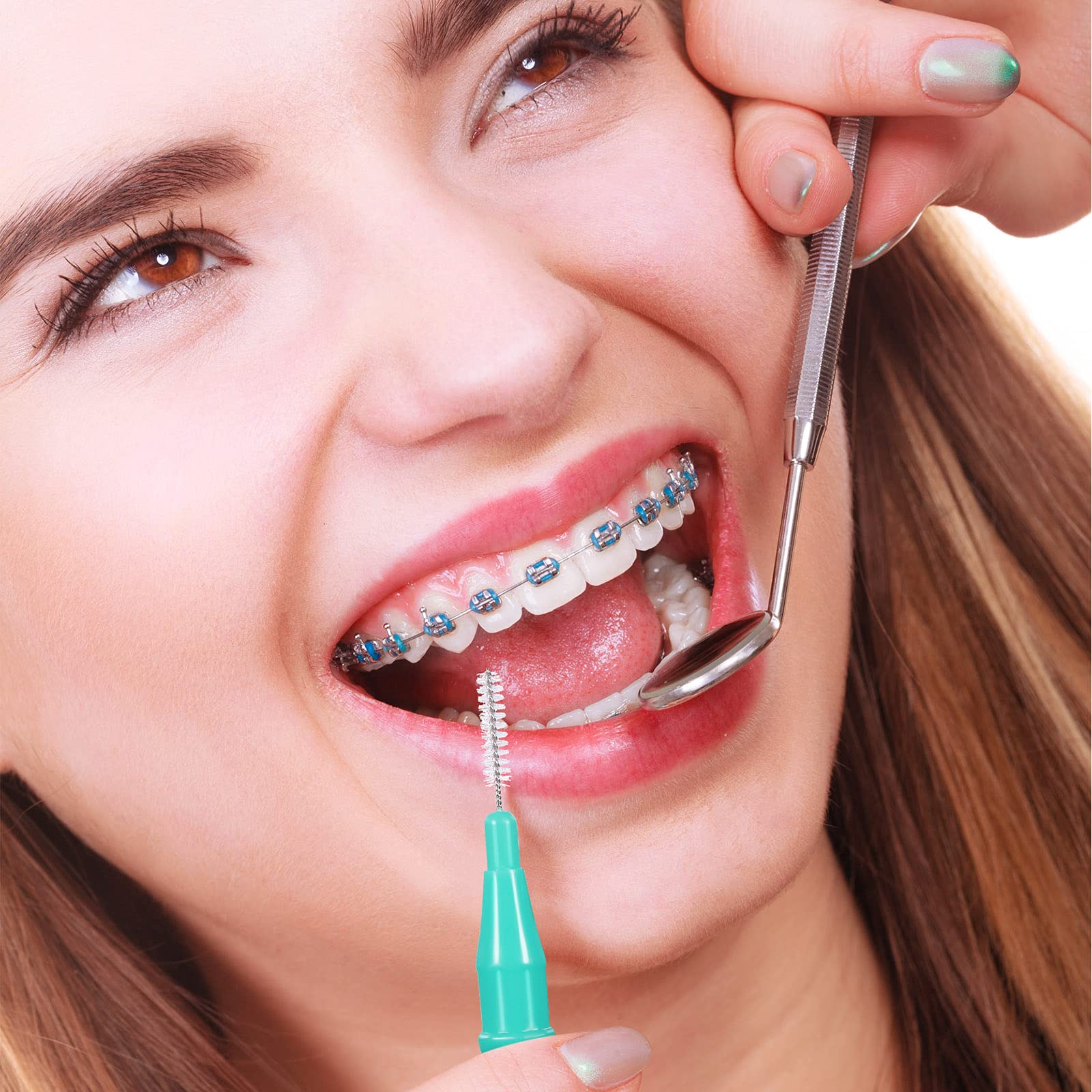 Assorted color interdental brushes packaged in Patelai kit