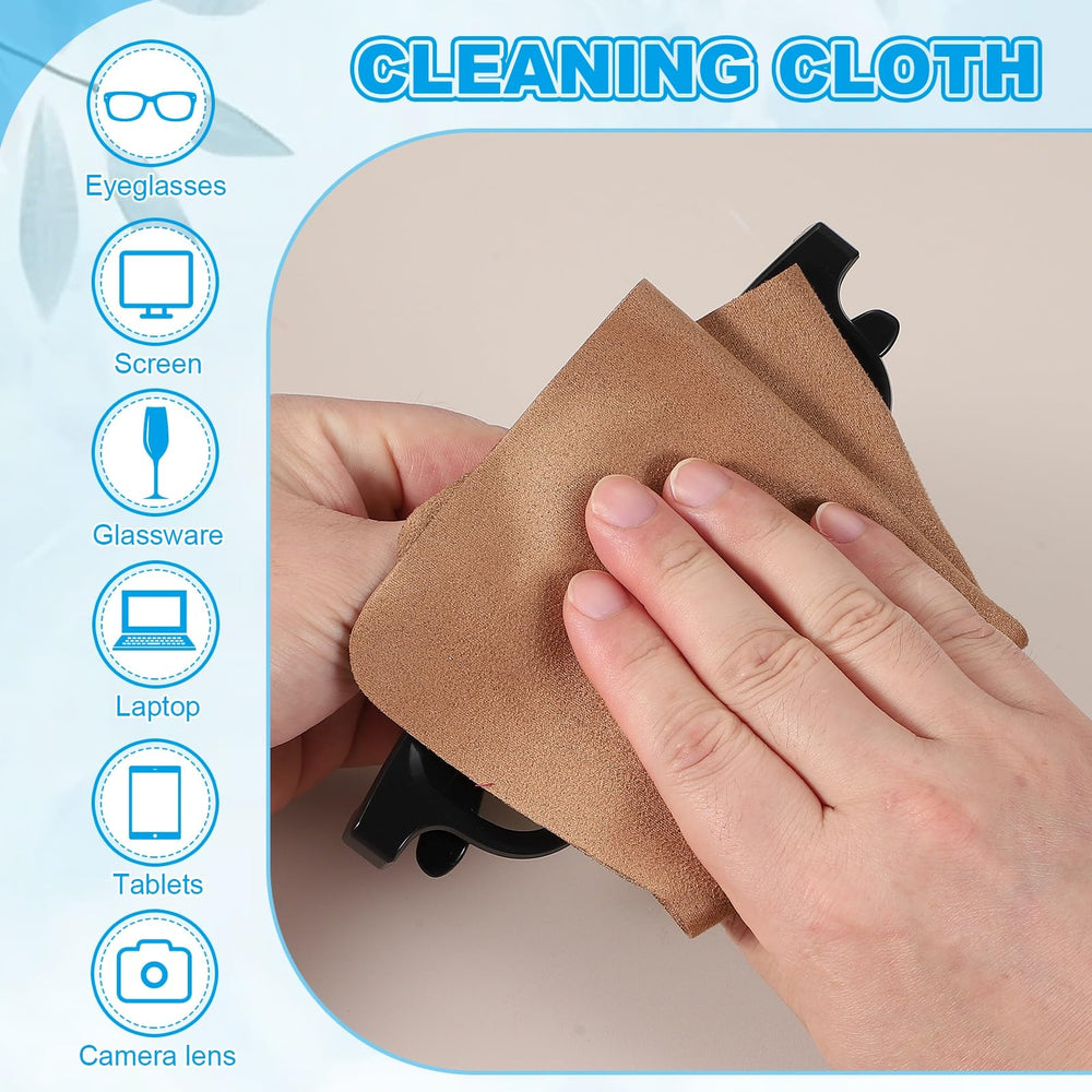 Cleaning cloth wiping a camera lens without scratches
