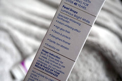 Teeth appearing instantly whiter after use