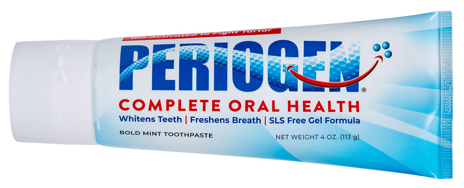 Periogen Oral Rinse beside toothpaste tubing