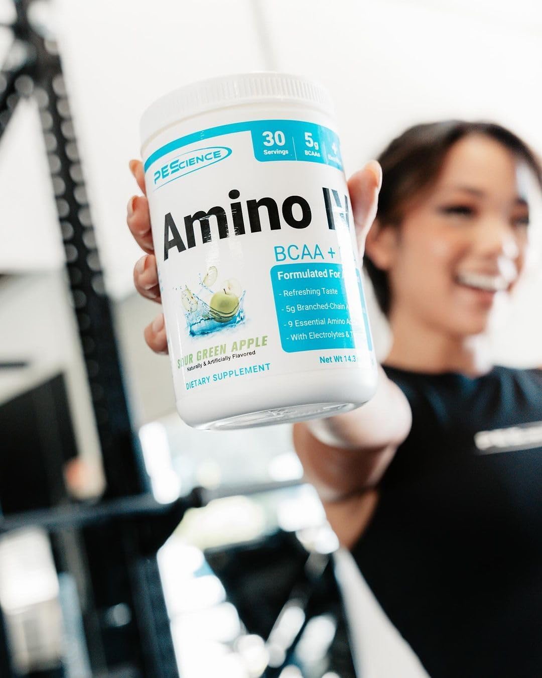 PEScience Amino IV label close-up emphasizes electrolyte blend for hydration.