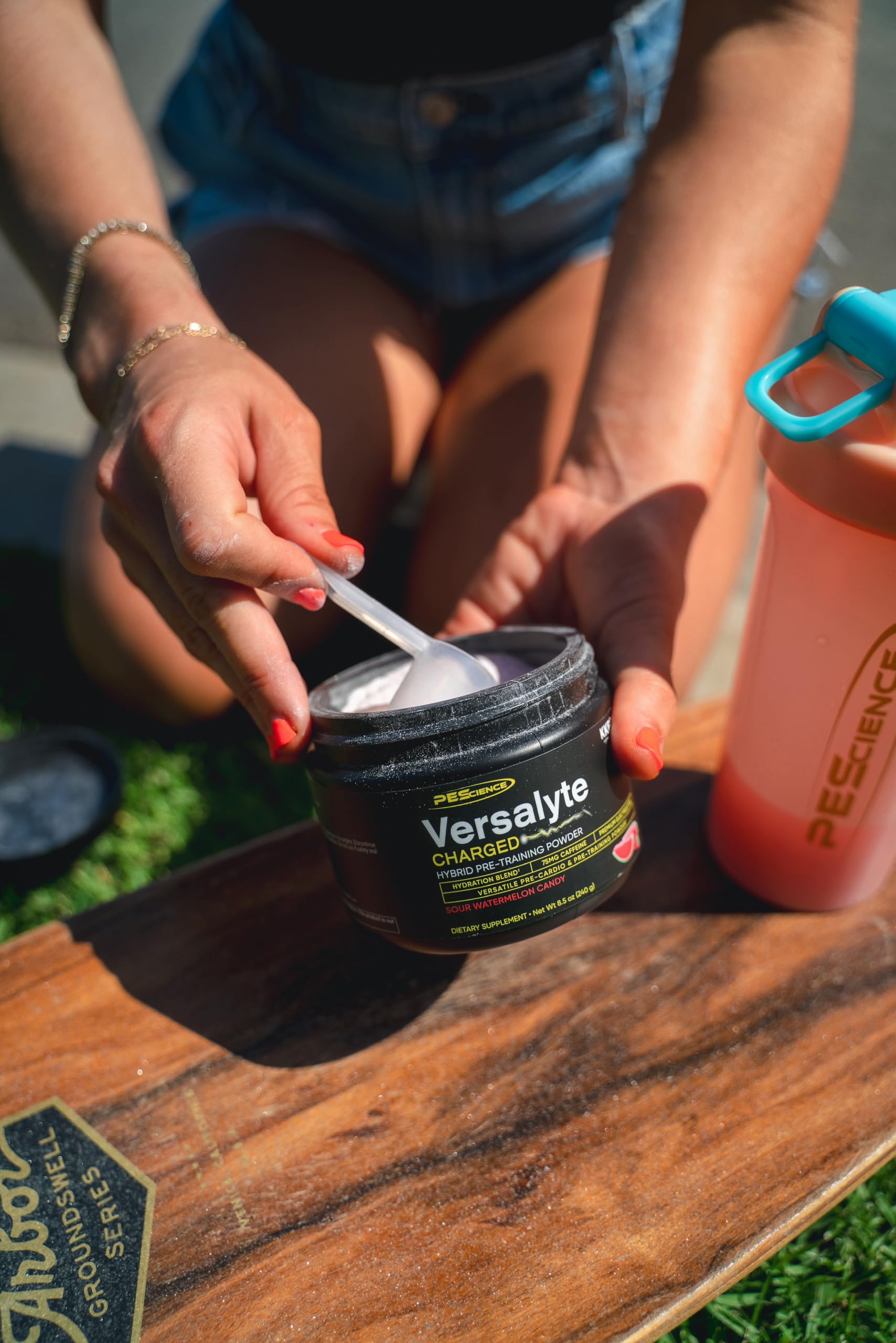 PEScience Versalyte Charged hydration graphic highlighting electrolytes and energy