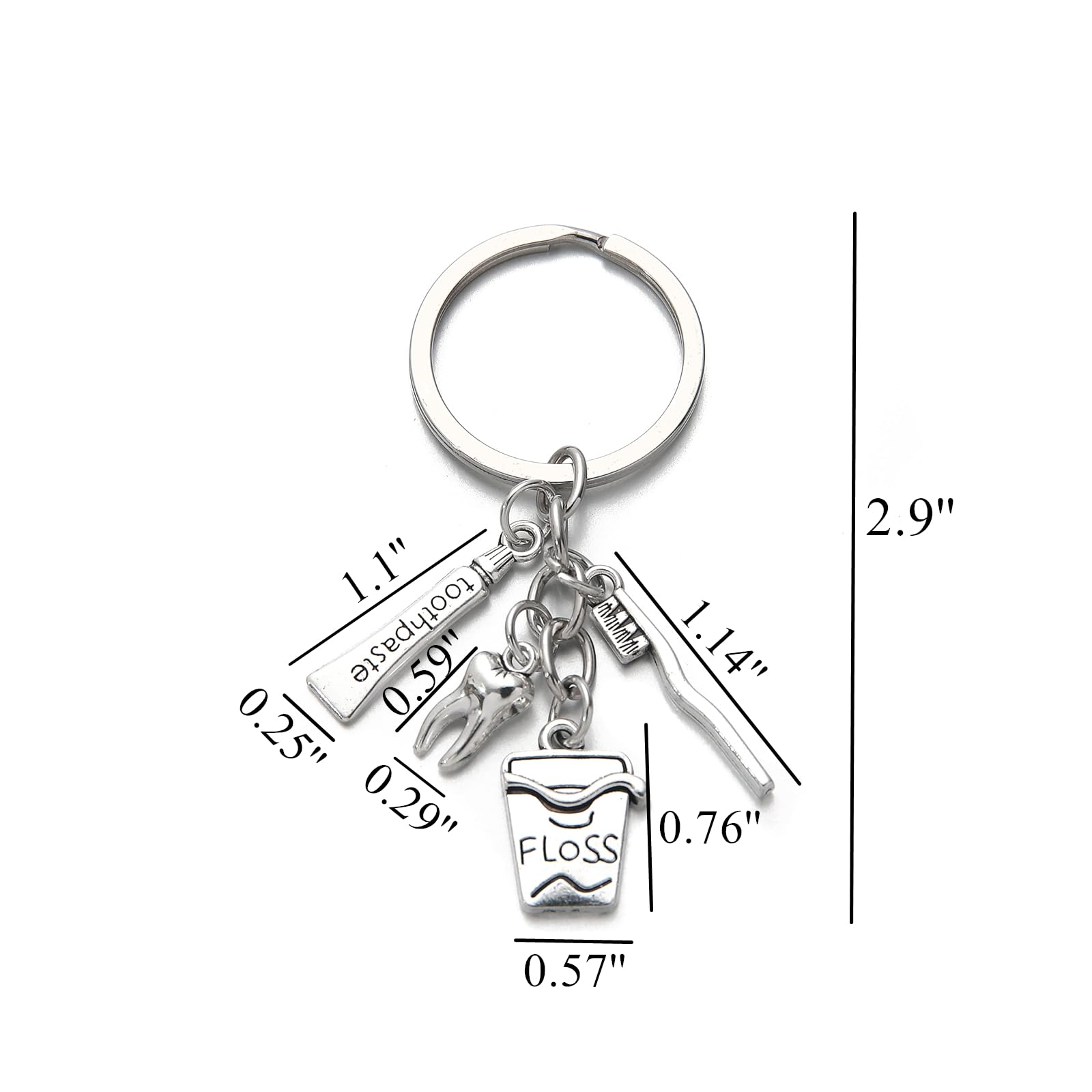 Close-up of zinc alloy toothbrush toothpaste keychain pendant