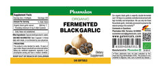Close-up of black garlic capsules