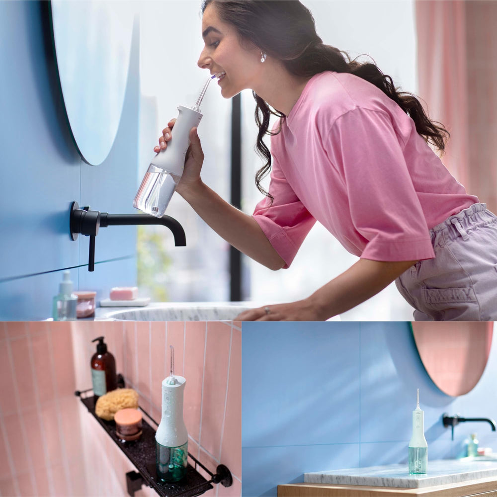 Back view showing compact design of the Water Flosser Mint
