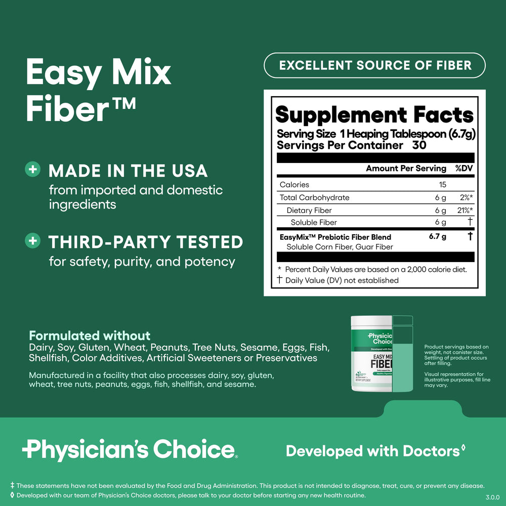 Measuring 1 tablespoon of Easy Mix Fiber for use in a drink