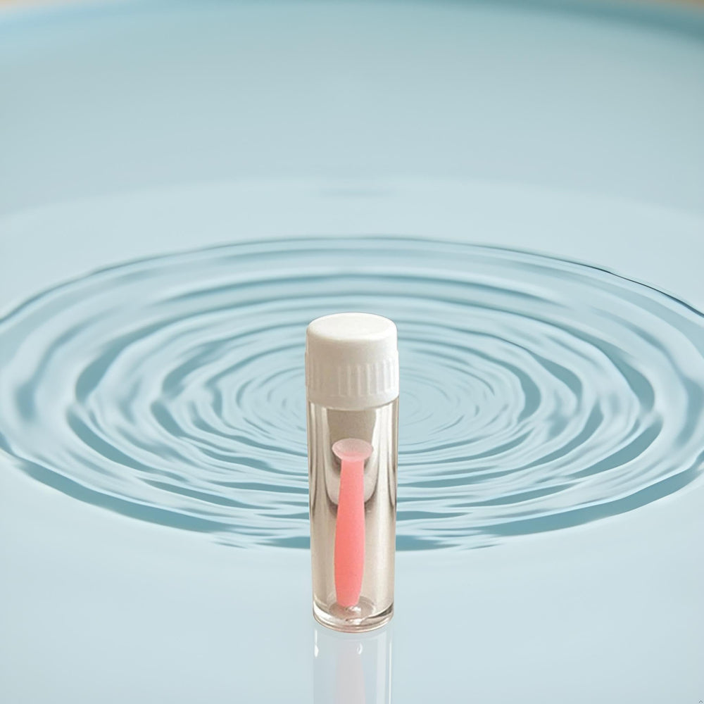 Using the pink insertion tool with a contact lens for one-handed operation