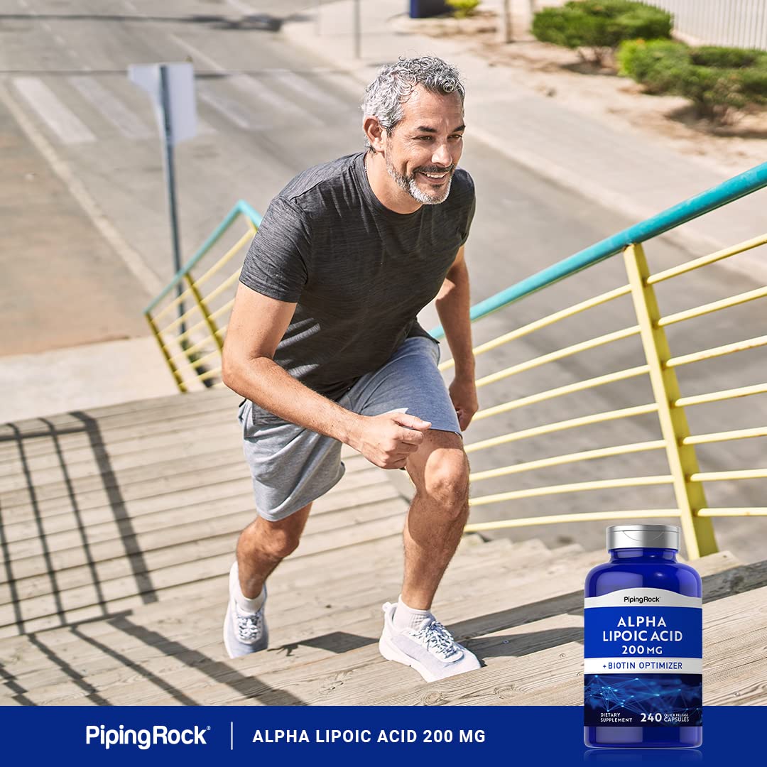 Supplement bottle and capsule close-up on white background
