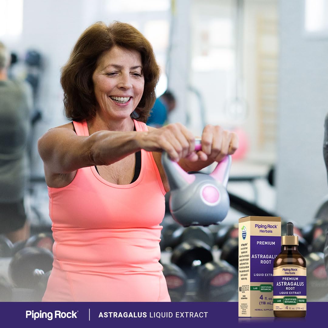 Pouring Astragalus Root Liquid Drops from bottle into dropper