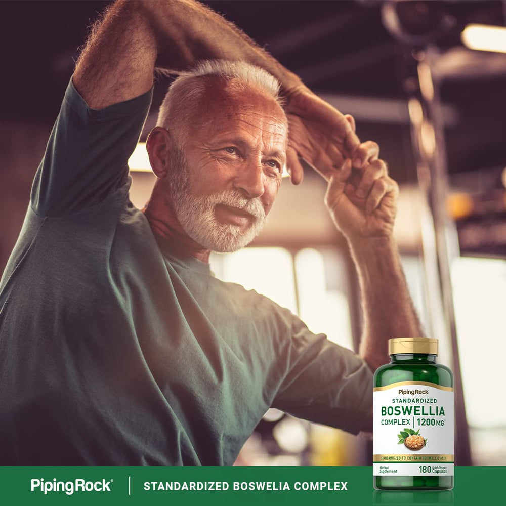 Piping Rock Boswellia extract capsules spilled on white background