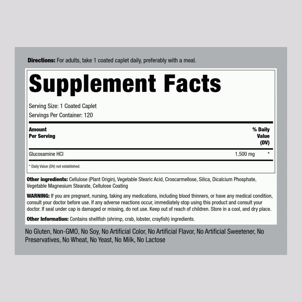 Coated glucosamine caplets displayed beside bottle