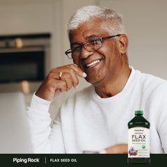 Piping Rock flaxseed oil being poured over salad illustrating easy, versatile use