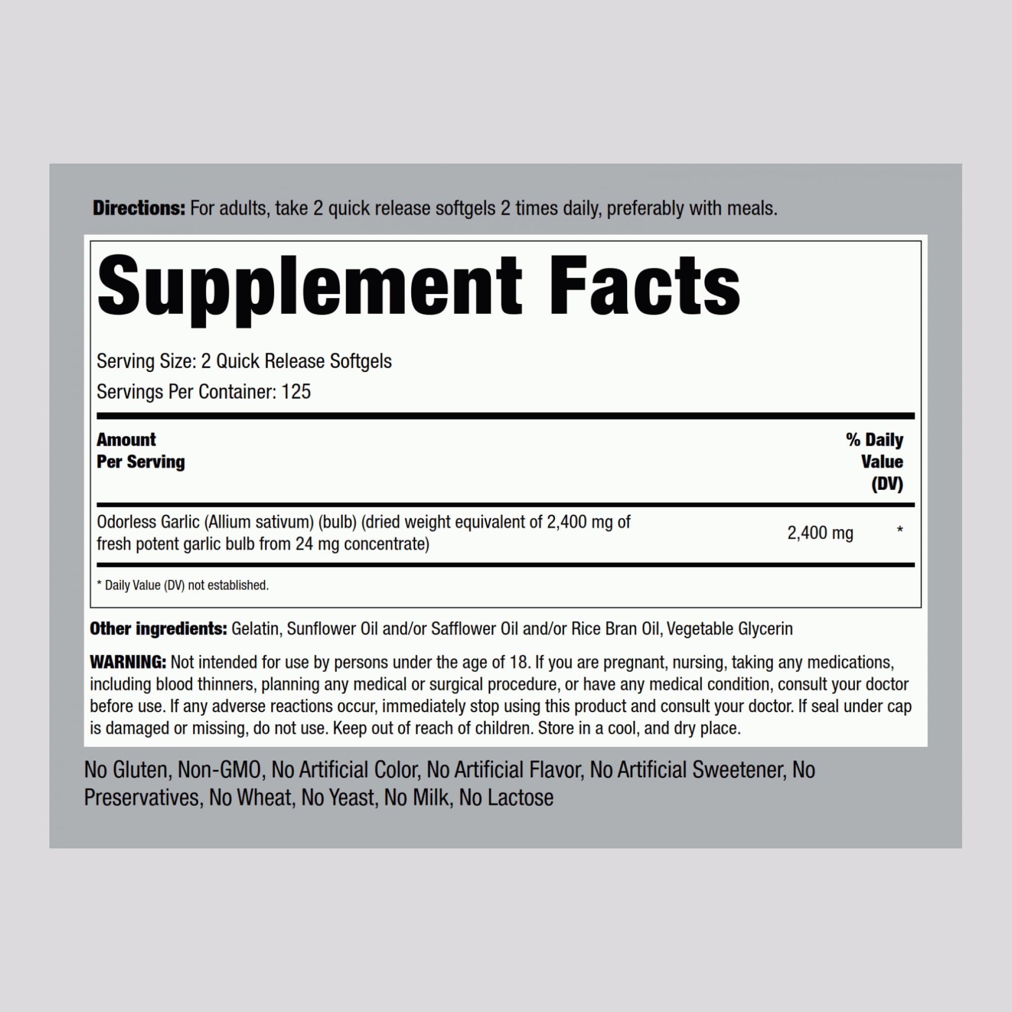 Garlic supplement bottle with product label close-up