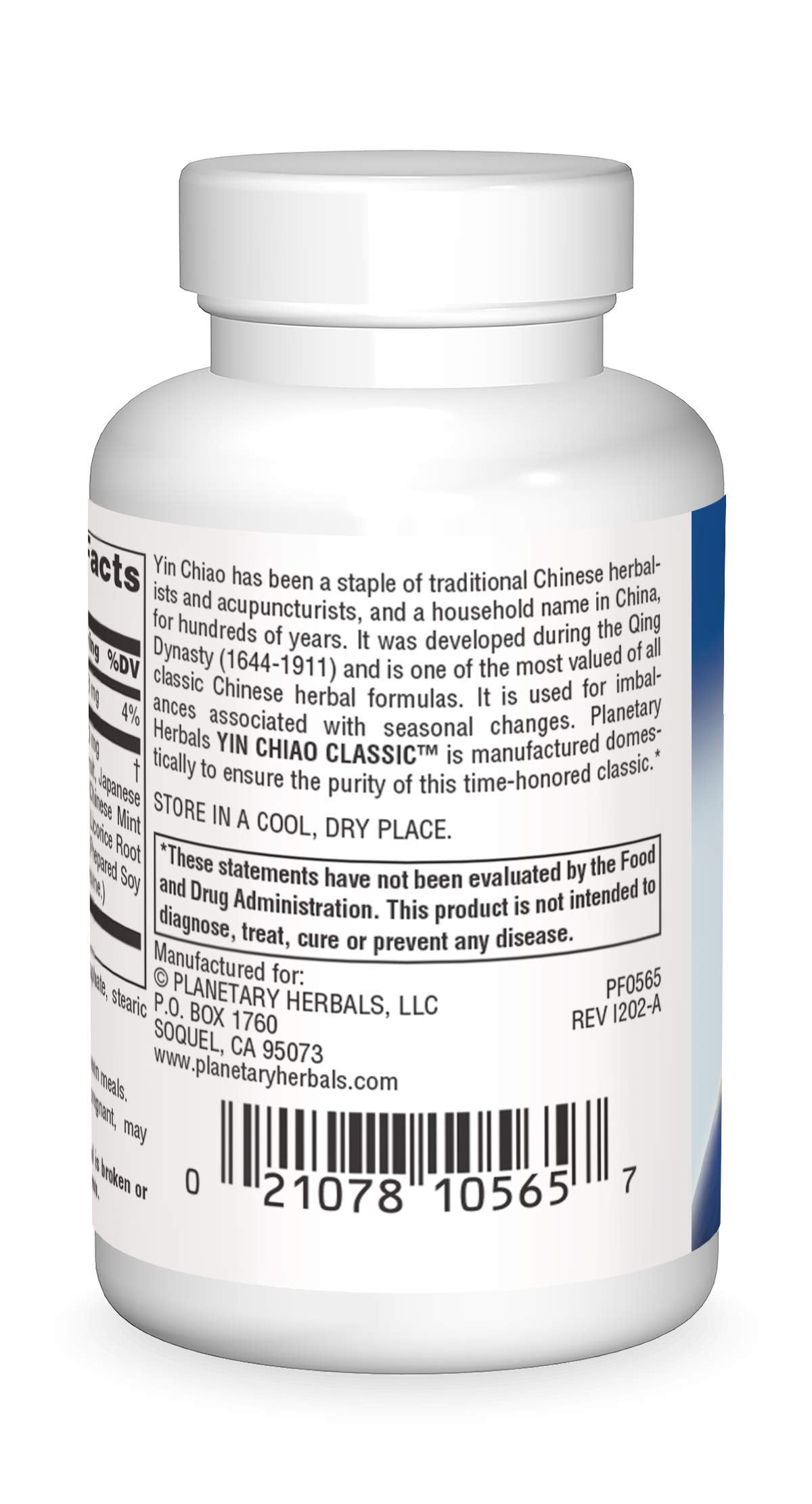 Close-up of Yin Chiao Classic Tablets bottle label and tablets