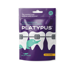 Close-up of Platypus orthodontic flossers designed to fit under the braces arch wire
