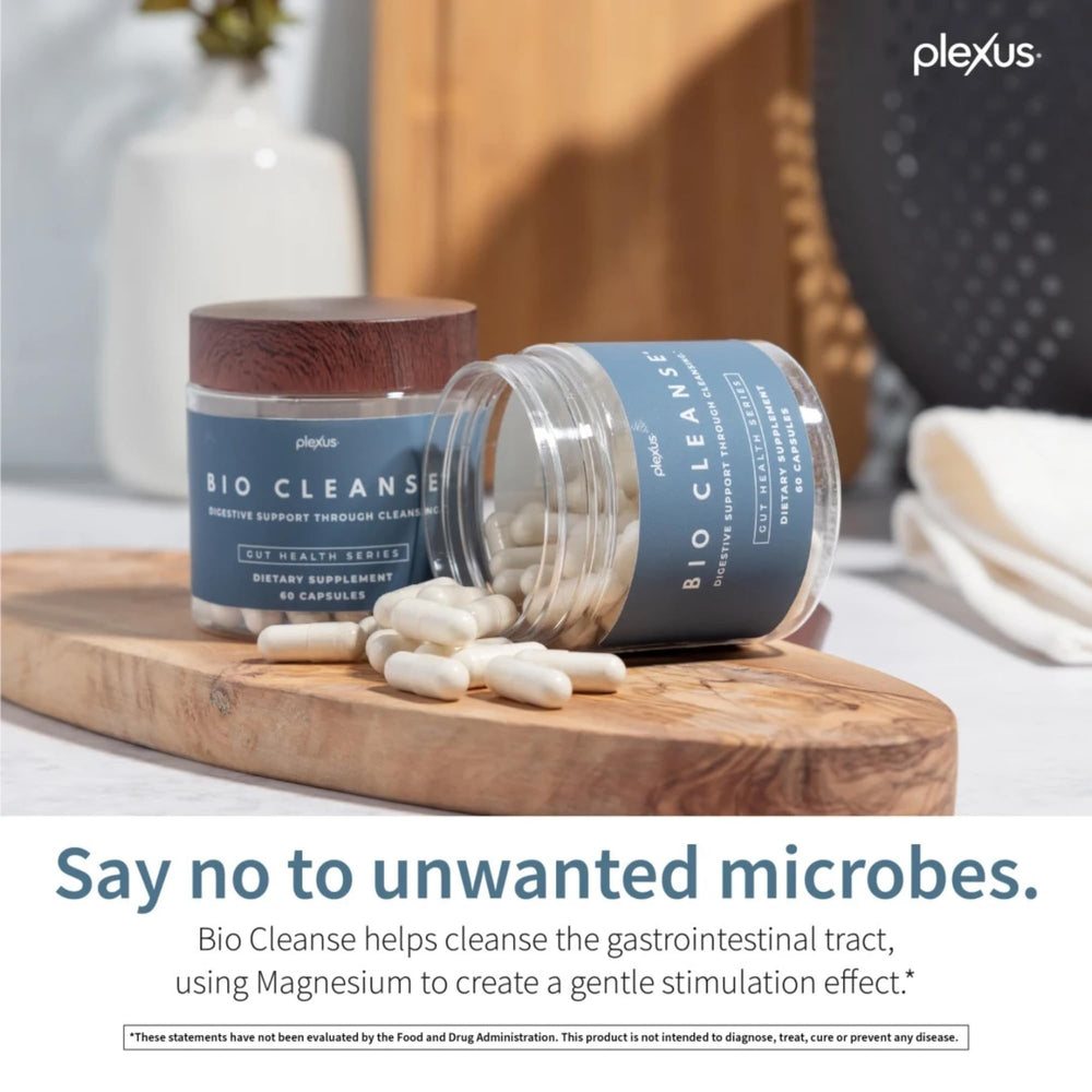 Bio Cleanse bottle with glass of water demonstrating usage