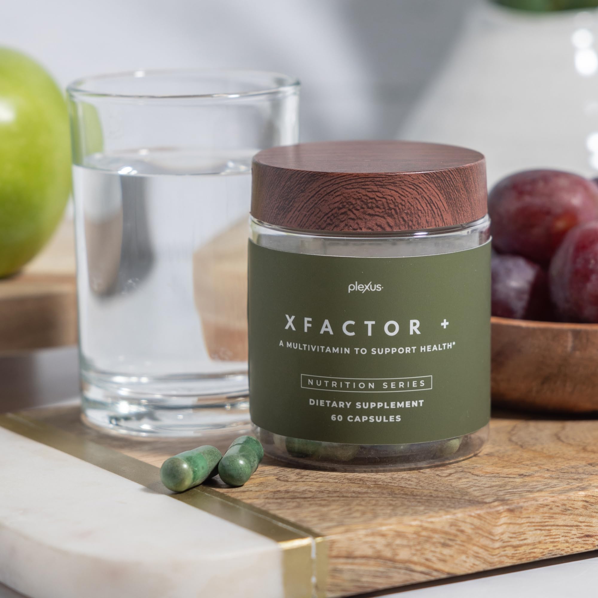 Close-up of Plexus Xfactor+® capsules being poured