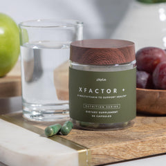 Close-up of Plexus Xfactor+® capsules being poured