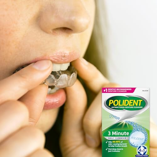 Clean dentures after soaking in Polident solution