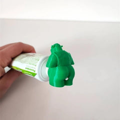 Green Pooping Toothpaste Cap side view