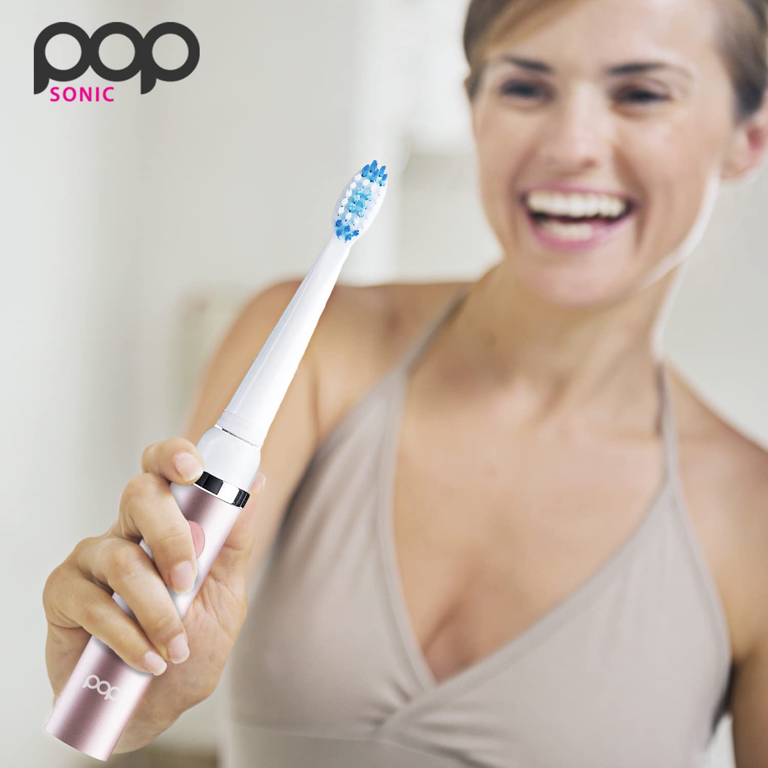 Packaging and warranty information for Pop Sonic Metallic Rose travel toothbrush