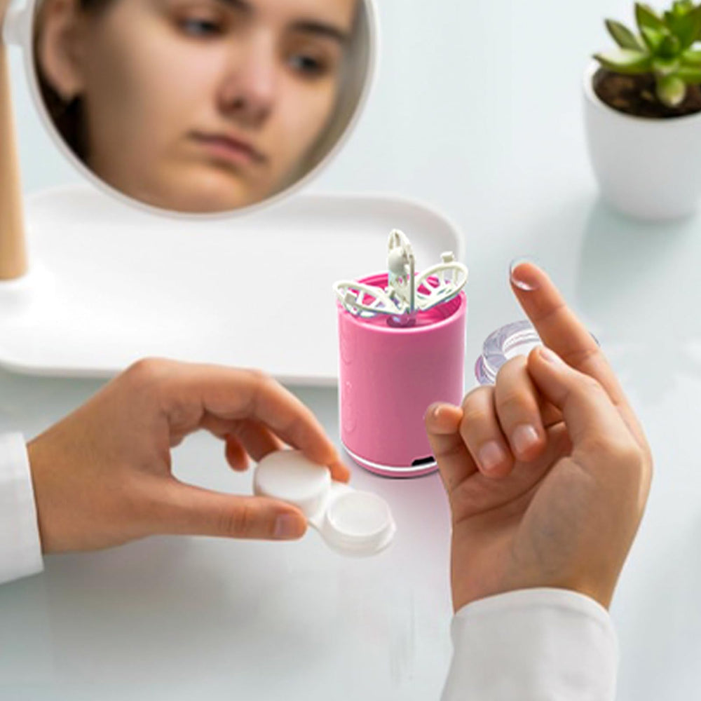 Waterproof cleaning chamber with transparent lid on pink device