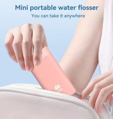 Travel cordless oral irrigator in pink