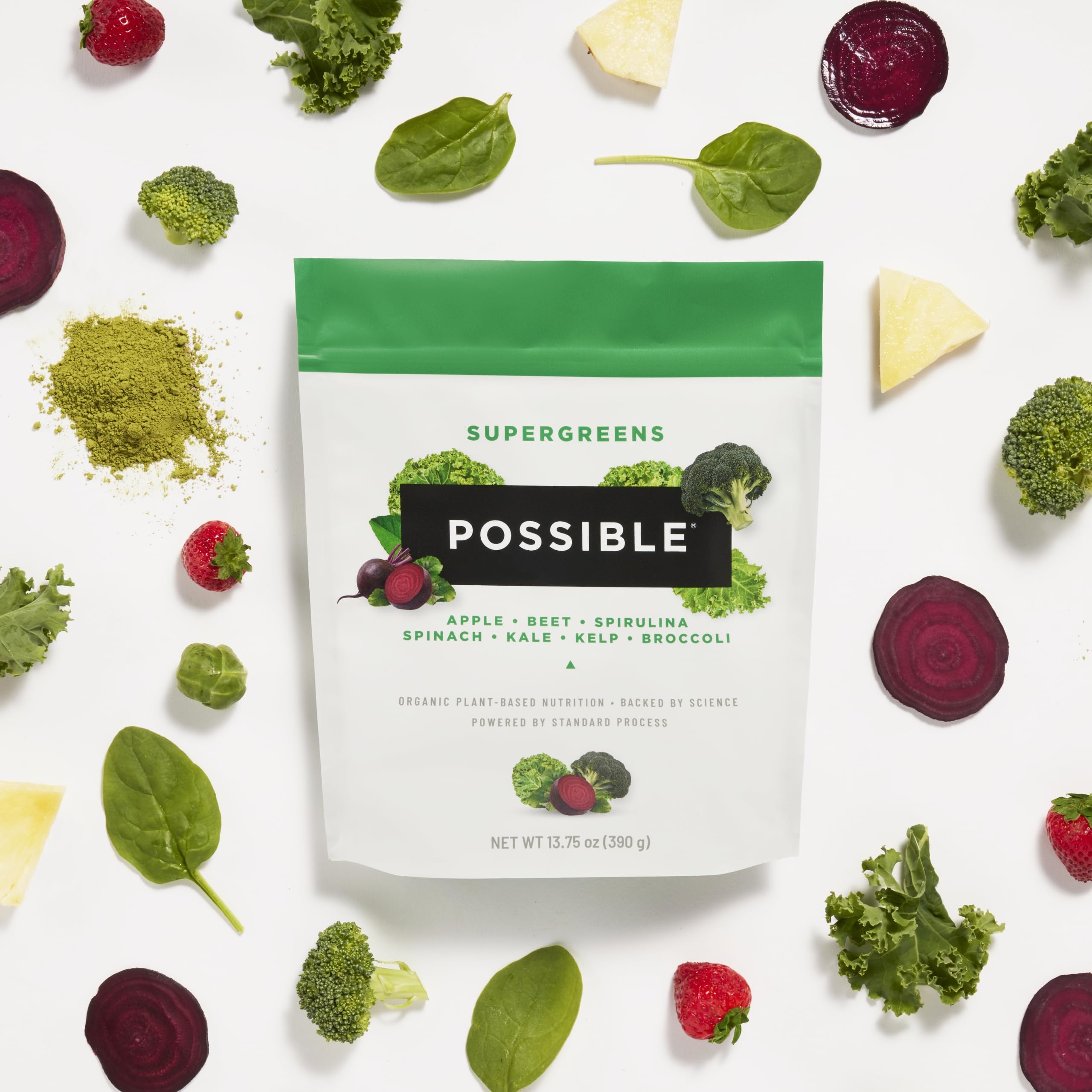 Possible SuperGreens powder being scooped for a serving