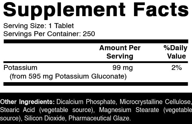 Close-up of a potassium gluconate tablet