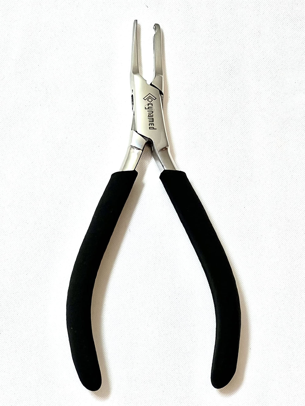 Hand using pliers to adjust glasses nose pad