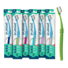 Preserve toothbrush with curved ergonomic handle made in the USA from recycled plastic
